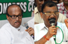 Will Monappa Bhandarys invitation  leave Janardhana Poojary fuming?